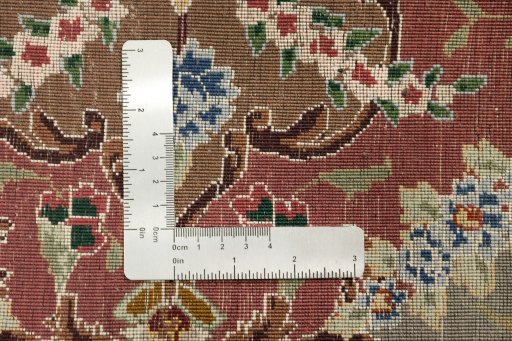 Close-up detail of New Tabriz Silk rug from Iran / Persia showing Wool weave