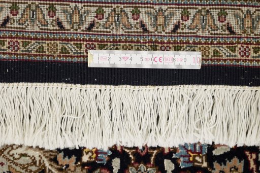 Close-up detail of New Tabriz Silk rug from Iran / Persia showing Wool weave