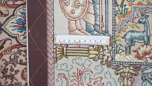 Corner detail of New Tabriz Silk rug showing border pattern and Wool pile