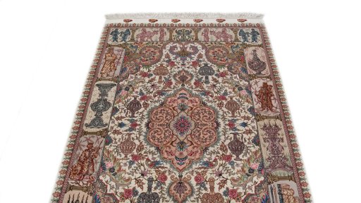 Backside of handmade New Tabriz Silk rug showing knot structure and weave density