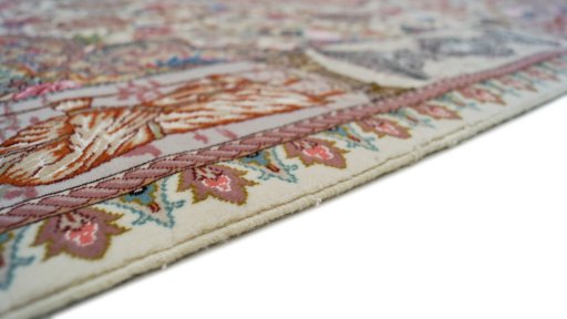 Central medallion detail of New Tabriz Silk rug from Iran / Persia