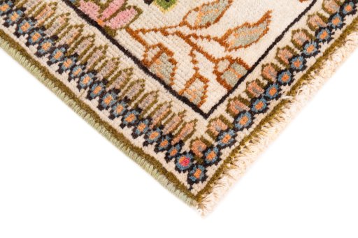 Central medallion detail of 2005s Tabriz Silk rug from Iran / Persia