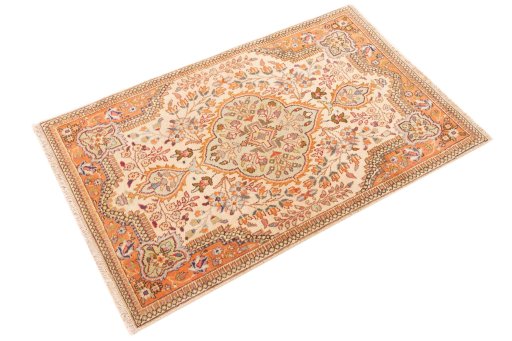Corner detail of 1998s Tabriz Silk rug showing border pattern and Wool pile