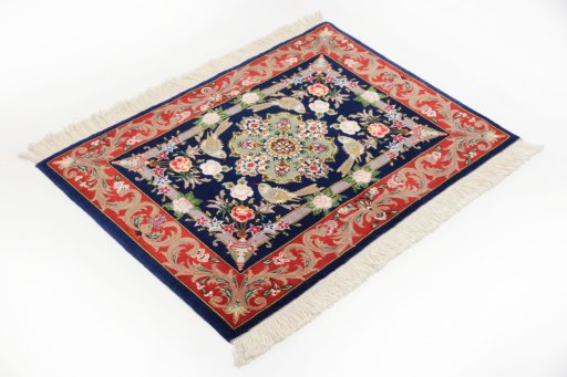 Corner detail of New Tabriz Silk rug showing border pattern and Wool pile