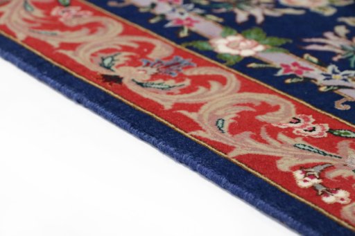 Central medallion detail of New Tabriz Silk rug from Iran / Persia