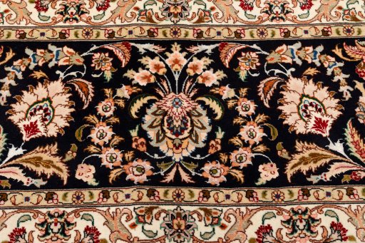 Backside of handmade 2020s Tabriz Silk rug showing knot structure and weave density