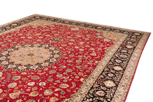 Surface texture of 2020s Tabriz Silk rug with natural Wool and intricate pattern