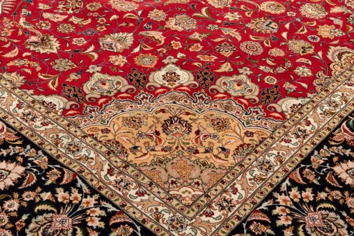 Backside of handmade 2020s Tabriz Silk rug showing knot structure and weave density