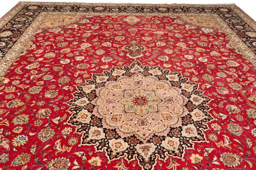 Full view of 2020s Tabriz Silk rug from Iran / Persia, 503 × 345 cm in Red tones