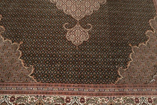 Close-up detail of 2019s Tabriz Silk rug from Iran / Persia showing Wool weave