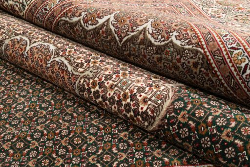Backside of handmade 2019s Tabriz Silk rug showing knot structure and weave density