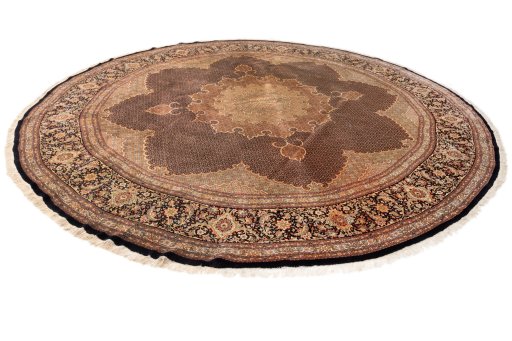 Close-up detail of 2020s Tabriz Silk rug from Iran / Persia showing Wool weave