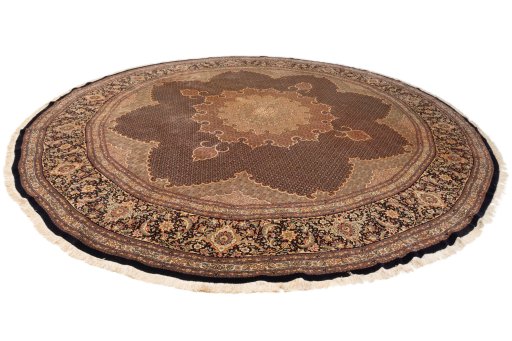 Surface texture of 2020s Tabriz Silk rug with natural Wool and intricate pattern