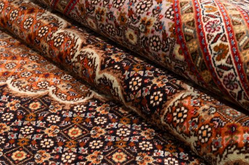 Surface texture of 2018s Tabriz Silk rug with natural Wool and intricate pattern