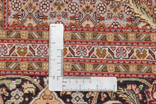 Central medallion detail of 2018s Tabriz Silk rug from Iran / Persia