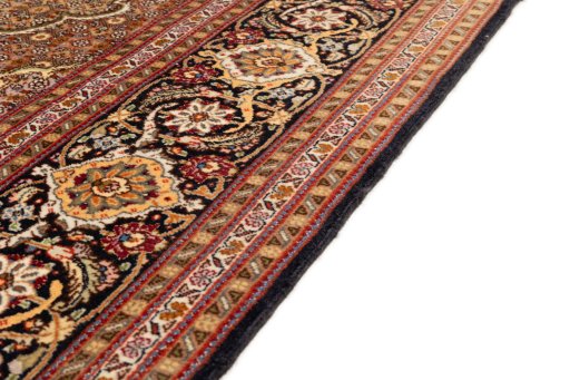 Close-up detail of 2018s Tabriz Silk rug from Iran / Persia showing Wool weave
