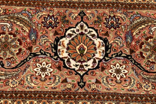 Close-up detail of 2018s Tabriz Silk rug from Iran / Persia showing Wool weave