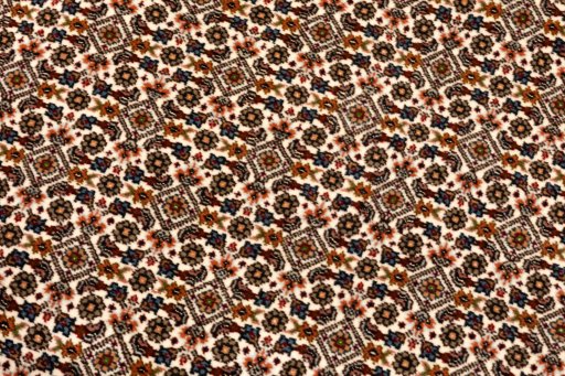 Surface texture of 2018s Tabriz Silk rug with natural Wool and intricate pattern
