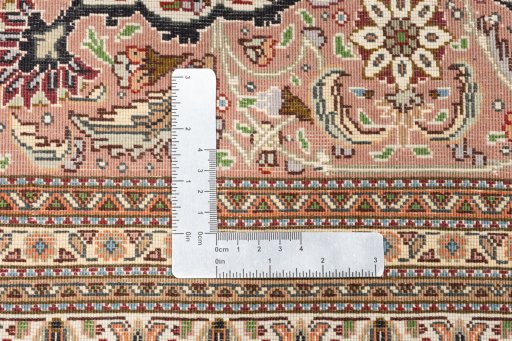 Close-up detail of 2018s Tabriz Silk rug from Iran / Persia showing Wool weave