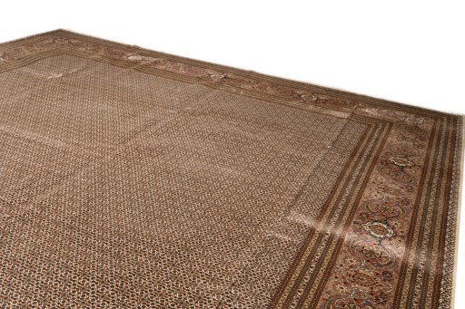Surface texture of 2018s Tabriz Silk rug with natural Wool and intricate pattern