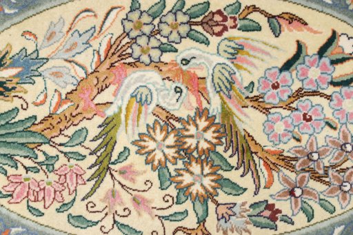 Backside of handmade New Tabriz Silk rug showing knot structure and weave density