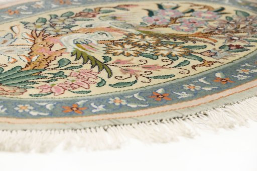 Central medallion detail of New Tabriz Silk rug from Iran / Persia