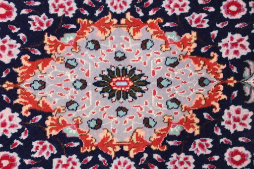 Surface texture of New Tabriz Silk rug with natural Wool and intricate pattern