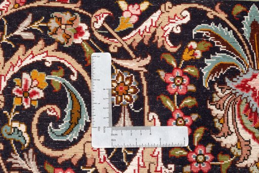 Central medallion detail of New Tabriz Silk rug from Iran / Persia