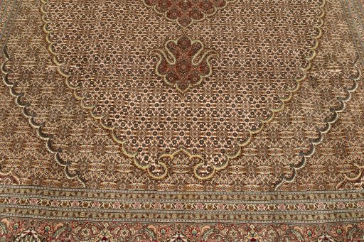 Close-up detail of New Tabriz Silk rug from Iran / Persia showing Wool weave