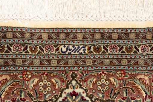 Surface texture of New Tabriz Silk rug with natural Wool and intricate pattern