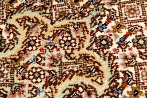 Central medallion detail of New Tabriz Silk rug from Iran / Persia