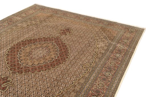 Surface texture of New Tabriz Silk rug with natural Wool and intricate pattern