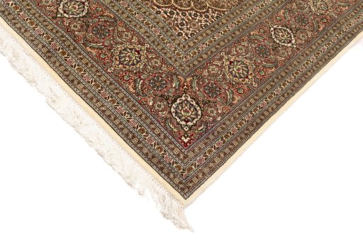 Central medallion detail of New Tabriz Silk rug from Iran / Persia