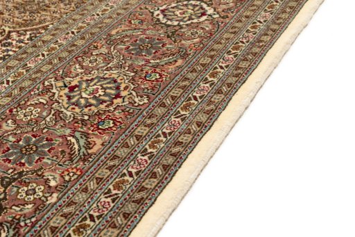 Close-up detail of New Tabriz Silk rug from Iran / Persia showing Wool weave