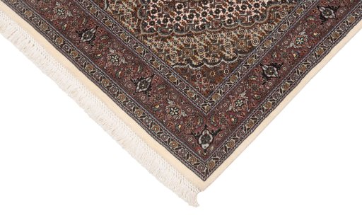 Close-up detail of New Tabriz Silk rug from Iran / Persia showing Wool weave
