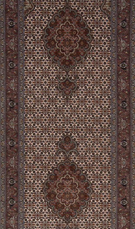 Surface texture of New Tabriz Silk rug with natural Wool and intricate pattern