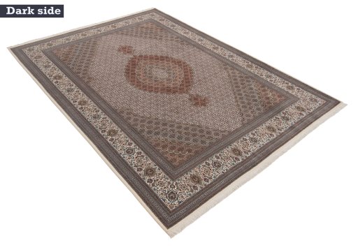 Corner detail of New Tabriz Silk rug showing border pattern and Wool pile