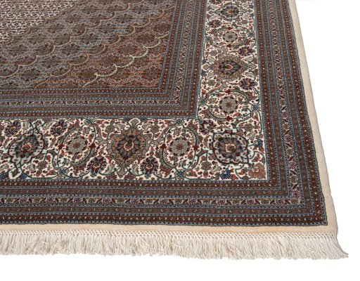 Close-up detail of New Tabriz Silk rug from Iran / Persia showing Wool weave