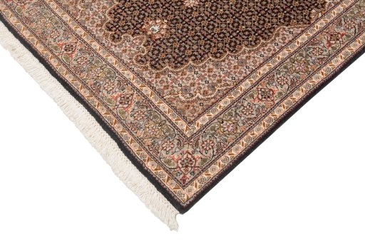 Corner detail of New Tabriz Silk rug showing border pattern and Wool pile