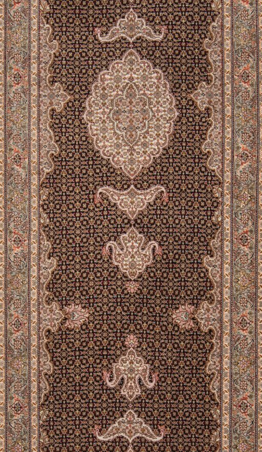 Corner detail of New Tabriz Silk rug showing border pattern and Wool pile