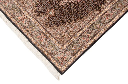 Corner detail of New Tabriz Silk rug showing border pattern and Wool pile