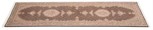 Close-up detail of New Tabriz Silk rug from Iran / Persia showing Wool weave