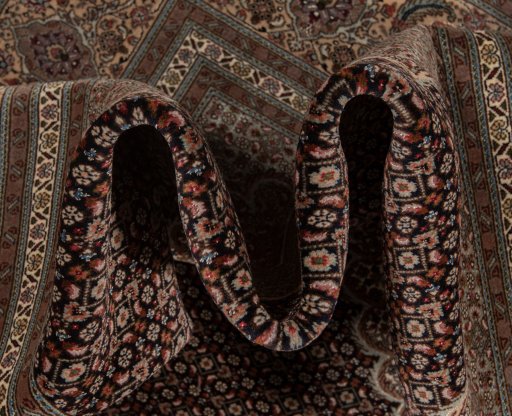 Surface texture of New Tabriz Silk rug with natural Wool and intricate pattern