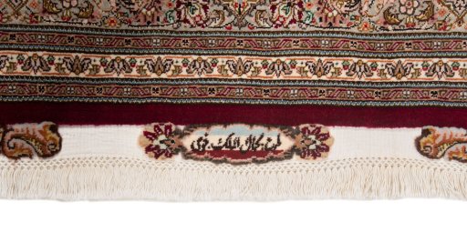 Close-up detail of New Tabriz Silk rug from Iran / Persia showing Wool weave