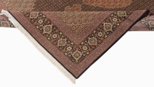 Backside of handmade New Tabriz Silk rug showing knot structure and weave density
