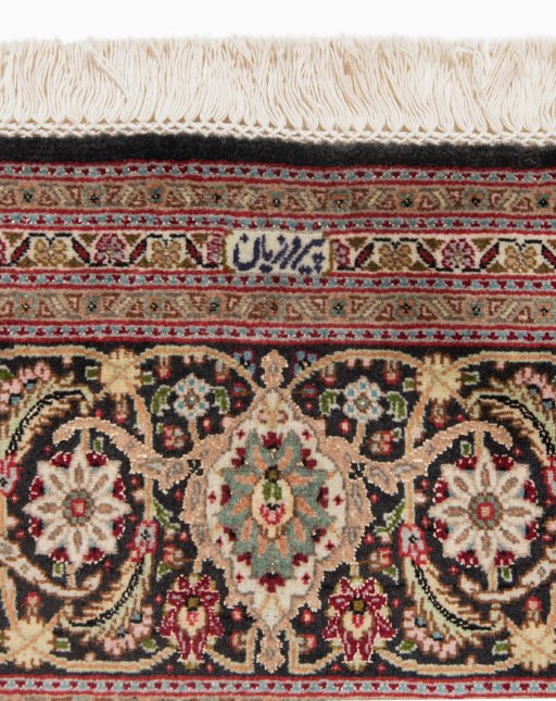 Corner detail of New Tabriz Silk rug showing border pattern and Wool pile