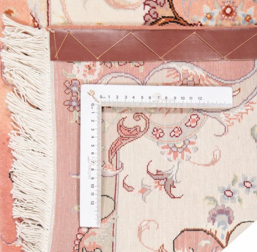 Corner detail of New Tabriz Silk rug showing border pattern and Wool pile