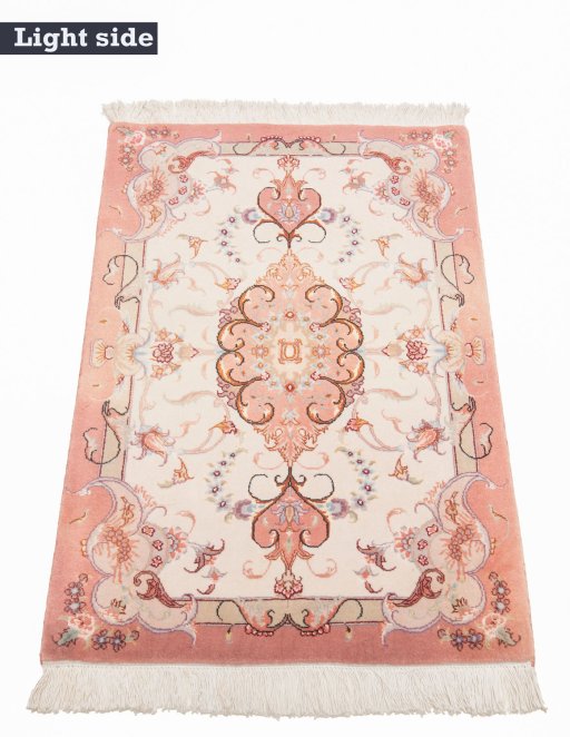 Surface texture of New Tabriz Silk rug with natural Wool and intricate pattern