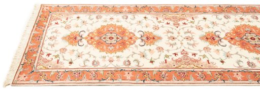 Corner detail of New Tabriz Silk rug showing border pattern and Wool pile