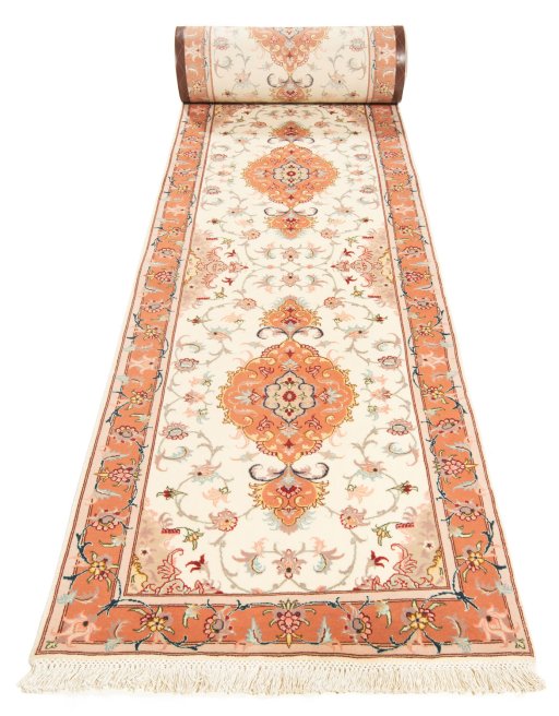 Close-up detail of New Tabriz Silk rug from Iran / Persia showing Wool weave